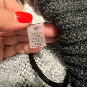 Gray and black sweater